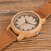 Prepare for compliments with this gorgeous caramel leather and wood watch w/classic buckle closure Shop Now