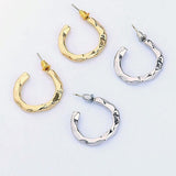 Dainty geometric hoop earrings Choice of gold or silver cut to create beautiful sparkle Small less than .5-inch W and L Impeccable quality, fine jewelry Lead and Nickel Free Prepare for compliments!