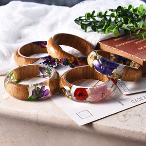 Gorgeous vintage style Bangle Wood Bracelets in captivating flower hues of Blue, Yellow, Red, Purple, and Wood Brown. Limited Must Have Shop Now