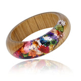 Gorgeous vintage style Bangle Wood Bracelets in captivating flower hues of Blue, Yellow, Red, Purple, and Wood Brown. Limited Must Have Shop Now