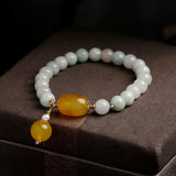 Clean vibrant fresh and fun elegance White Jade Beads, Red Agate or Yellow Agate with a natural white pearl detail trimmed in 14k gold Stunning must have 5mm, stretch for a perfect fit Prepare for compliments!