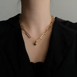 •	This chic Pin Clasp Gold Link Necklace is perfect for work or play •	Unique Pin Clasp that comes in two colors, gold or silver •	Durable, clean, and fun to wear •	Prepare for compliments! 