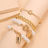 •	Trendy, fun, 4pc set layered look •	Gold tone simulated pearl, superior quality, durable, and gorgeous •	Each bracelet is light weight and 7 inches with a beautiful lobster claw clasp •	Layer all 4pcs together or wear individually •	Perfect for parties, work, or date night •	Prepare for compliments!