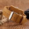 Prepare for compliments with this simple clean caramel colored leather band bamboo watch.  Shop Now