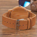 Prepare for compliments with this gorgeous caramel leather and wood watch w/classic buckle closure Shop Now