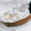 Dainty geometric hoop earrings Choice of gold or silver cut to create beautiful sparkle Small less than .5-inch W and L Impeccable quality, fine jewelry Lead and Nickel Free Prepare for compliments!