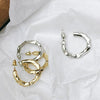 Dainty geometric hoop earrings Choice of gold or silver cut to create beautiful sparkle Small less than .5-inch W and L Impeccable quality, fine jewelry Lead and Nickel Free Prepare for compliments!