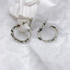 Dainty geometric hoop earrings Choice of gold or silver cut to create beautiful sparkle Small less than .5-inch W and L Impeccable quality, fine jewelry Lead and Nickel Free Prepare for compliments!